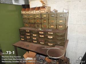 Steel-drawer cabinet and table with miscellaneous hardware