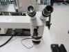MOTIC DUAL HEADED BINOCULAR STEREO MICROSCOPE WITH 10X EYES, AND SCIENSCOPE IL-FOI-150 PLUS HALOGEN LAMP - 2