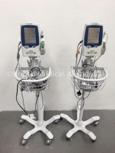 2 x Welch Allyn Spot Vital Signs LXi Patient Monitors on Stands with SPO2 Finger Sensors and BP Hoses (Both Power Up)