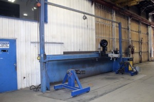 CUSTOM ROTATING SUBARC WELDING SYSTEM CONSISTING OF: 20’ side beam weld frame w/approx. 10’ ht. under weld head, adjustable rail ht., Miller Subarc Interface digital unit, Lincoln TC3 variable spd. weld carriage, 2-axis slide w/approx. 36” X 12” travels