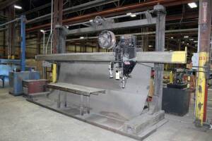 FIXED TABLE SYSTEM, WEBB MDL. U-6 CONSISTING OF: 20’ side beam weld frame w/approx. 10’ ht. under weld head, power rail adj., adjustable rail ht., Lincoln NA-3N subarc controls, Lincoln weld head & flux hopper, Miller Lincoln DC-1000 welding power supply