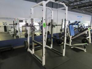 Squat Cage Atlantis w/ 45lb Olympic bar, w/ (5) 45lb Iron Olympia, (1) 45lb YRC, (4) 10lb YRC, (2) 5lb YRC & (2) 2.5lb YRC