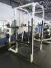 Squat Cage Atlantis w/ 45lb Olympic bar, w/ (5) 45lb Iron Olympia, (1) 45lb YRC, (4) 10lb YRC, (2) 5lb YRC & (2) 2.5lb YRC - 7