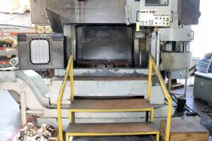 CNC VERTICAL BORING MILL, FEMCO MDL. WVL-12, new 3/2007, Fanuc 0i-TC CNC control, 49.21" 4-jaw chuck size, 62.99" max. swing, 49.6" max. turning ht., 39.4" Z-axis stroke, 39.4" cross rail, 2.8-280 RPM, 60 HP, 12 pos. ATC, chip conveyor, mist collector, S/