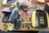 LOT CONSISTING OF: Dewalt screw gun, Ryobi impact wrench, Stanley battery charger, misc. bits