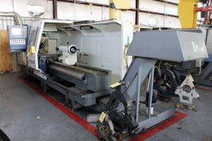 CNC FLATBED LATHE, WEILER MDL. E70X3000, new 2004, 28" swing over bed, 17" swing over crosslide, 120" dist. btwn. centers, 8.5" spdl. hole, spds: 1-900 RPM, 50 HP, Aloris tool post, (2) steadyrests, chip conveyor, (2) MPG handles, 23-1/2" dia. 4-front & r