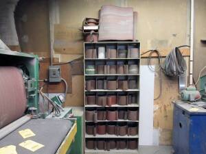 LOT CONSISTING OF: sanding material, cabinets, worktables