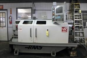 CNC TOOLROOM LATHE, HAAS MDL. TL-2, new 2005, Haas CNC control, 4 pos. indexable turret, 10” dia. 3-jaw chuck w/3” bore, 20" sw. over front of apron, 11" over crosslide, 48" max. cutting length, 2.3" spdl. bore, 10 HP spdl. motor, tailstock, steadyrest, S