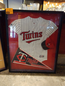 34" x 42" framed "Twins" jersey with cap and banner