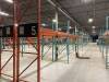 GLOBAL OFFER- 305 sections of Industrial Pallet Racking (48"W) - ALREADY DISMANTLED - photos show assets as they were prior to being dismantled and stacked as well as current positions in the warehouse (stacked and or leaned). To win this lot, the winning - 2