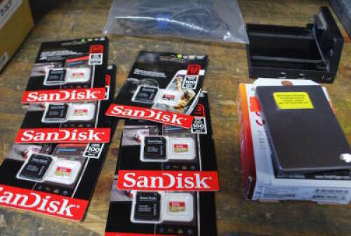 Lot Seagate GoFlex Desktop Adapter Thunderbolt, Seagate 2GB Portable Hard Drive and (6) Sandisk Extreme Pro 32GB Micro SD Card