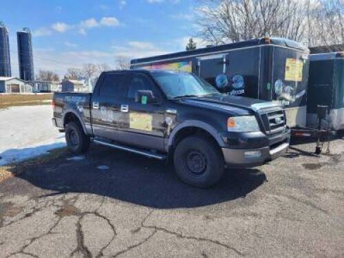 FORD F150 5.4L automatique, noir, et avec ensemble de pneu d'&eacute;t&eacute; suppl&eacute;mentaire, 337,000km - 2005 - Bien entretenue avec plusieurs am&eacute;liorations.