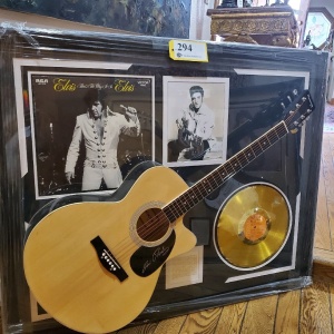 ELVIS MEMORABILIA FRAME WITH ACOUSTIC GUITAR AND "THAT'S THE WAY IT IS" GOLD RECORD (UNAUTHENTIC) (43X35)
