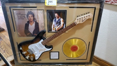 BRUCE STRINGSTEEN MEMORABILIA FRAME WITH ELECTRIC GUITAR AND "DARKNESS ON THE EDGE OF TOWN" GOLD RECORD (SIGNATURES NOT AUTHENTICATED ) (43X35)