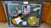 QUEEN MEMORABILIA FRAME WITH ELECTRIC GUITAR AND "NEWS OF THE WORLD" GOLD RECORD (SIGNATURES NOT AUTHENTICATED ) (43X35)