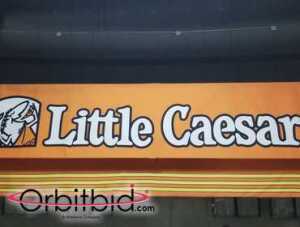 Little Caesar lighted 4-menu board, awning, (4) light fixtures. Buyers responsibility for proper...