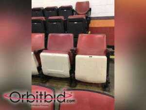 Lot of (50) Red Joe Louis Arena Seats, (25) sets of two, Floor mounted from general inventory....