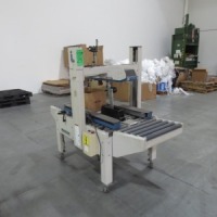 Inter pack carton sealer