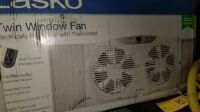 Lasko Twin Window Fan w/Remote Items must be paid for & removed by 4:00 PM on Friday, October 6, 2023. No Exceptions!
