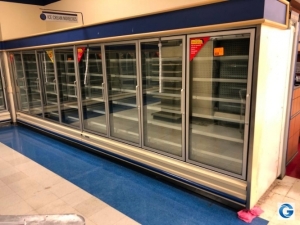 Hussmann NRCV4, '1996 silver frozen food doors with gas defrost, vertical lights, and solid deck