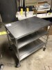 Portable stainless-steel cart 34 in H, 3 shelves, 22.5 in by 34.5 in surface area