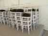 50 x White Stackable Banquet Dining Chairs with Green Fabric Cushion Seats. (Located: Clare)