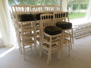 50 x White Stackable Banquet Dining Chairs with Green Fabric Cushion Seats. (Located: Clare)