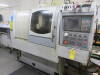 Ganesh Model Cyclone-32CS, CNC Swiss Type Twin Spindle Automatic Screw Machine, S/N CB981002 (New 2009), 1" Max. Bar Dia., 7.5-HP Spindle Drive, 6,000-RPM Max. Spindle Speed, 13" X-Axis, 10.63" Z-Axis, Fanuc Model 10H CNC Control, Chip Blaster, High Press