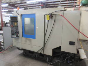 KIA Model Kia Center V25P, 3-Axis CNC Drilling & Tapping Machine, S/N KV25050 (New 1996), Travels: X=16.5", Y=11", Z=15", 10,000-RPM Spindle Speed, (2) 10" x 60" Pallets, 10-Position Automatic Tool Changer, No. 30 Spindle Taper, Coolant System, Fanuc O-M 
