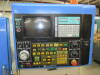 KIA Model KT15, CNC Lathe, S/N KT15147 (New 1994), 17.7" Max. Swing, 6.5" Turning Dia., 1.77" Spindle Bore, 1.49" Max. Bar Capacity, 14" Max. Machining Length, 5,000-RPM Max. Spindle Speed, 10-HP Main Spindle Drive, 12-Position Turret, with Yasnac CNC Con - 2