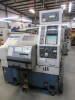 Mori Seiki Model CL-20A, Slant Bed CNC Turning Center, S/N 990 (New 1992), 20.03" Swing Over Bed, 9.5" Swing Over Cross Slide, 16.4" Max. Turning Dia., 14.6" Turning Length, 4,500-RPM Max. Spindle Speed, Travels: 9.25" X-Axis, 12.20" Z-Axis, 15-HP Main Sp
