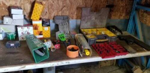 Assorted contents of shelf including gasket set, bit set, hand light