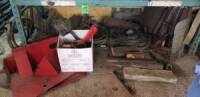 Contents of bottom shelf including separator guard and pieces for CASE IH combine
