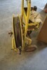 Metal strapping machine with tools on wheeled base - 2