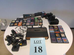 ATARI CONSOLE WITH VIDEO GAMES, (3) SAITEK CONTROL UNITS, AND OCULUS HEADSET, (NO AC UNIT)