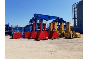 SELF-ERECTING TOWER BURKHALTER Self-Erecting Tower BSET, Modular, Containerized, Towertype Lift & Set System with a capacity of 1,200-Tons ...